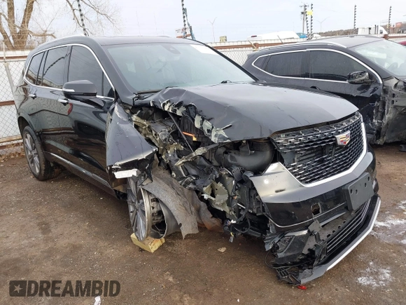 2021 Cadillac XT6 Premium Luxury z VIN 1GYKPDRS9MZ120150, wystawiony jako IAAI lot #41715368 z przebiegiem 47 835 mil mil oraz . Historia ofert i sprzedaży dostępna na DreamBid. Obrazek 1.