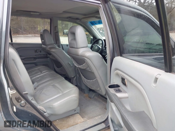 2005 Honda Pilot EX-L with VIN 5FNYF18535B011199, listed as a IAAI auction lot 41802730 with 298,903 mi miles. Bid and sale history available at carsss.com. Image 8.