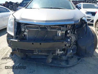 2012 Cadillac SRX Luxury Collection with VIN 3GYFNAE36CS509456, listed as a IAAI auction lot 41833647 with 119,931 mi miles and . Bid and sale history available at carsss.com. Image 6.