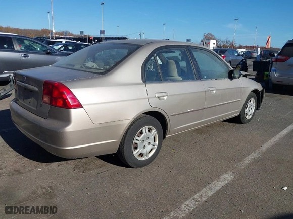 2002 Honda Civic LX with VIN 2HGES16642H552358, listed as a IAAI auction lot 40757858 with 138,320 mi miles. Bid and sale history available at carsss.com. Image 4.