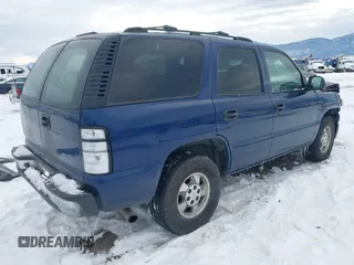 2002 Chevrolet Tahoe LS with VIN 1GNEK13V12J330179, listed as a IAAI auction lot 41382530 with 216,051 mi miles and . Bid and sale history available at DreamBid. Image 4.