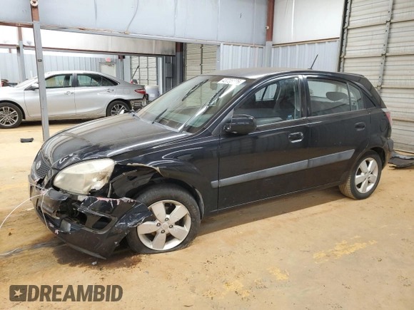 2009 Kia Rio LX with VIN KNADE243896580883, listed as a Copart auction lot 43735505 with 135,726 mi miles and Salvage Title. Bid and sale history available at carsss.com. Image 1.