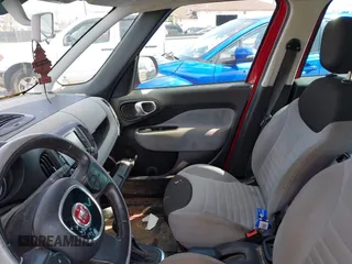 2014 FIAT 500L Easy with VIN ZFBCFABH4EZ018172, listed as a IAAI auction lot 42099424 with 138,650 mi miles and . Bid and sale history available at DreamBid. Image 5.