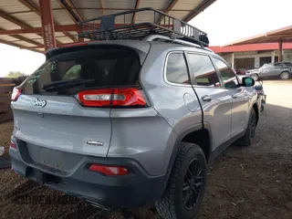 2017 Jeep Cherokee Latitude with VIN 1C4PJMCS4HW665167, listed as a IAAI auction lot 42054133 with 77,361 mi miles and . Bid and sale history available at DreamBid. Image 4.