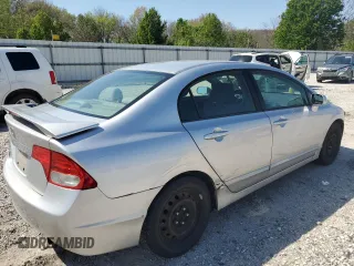 2010 Honda Civic LX with VIN 19XFA1F51AE016877, listed as a Copart auction lot 52275475 with 217,152 mi miles and Salvage Title. Bid and sale history available at DreamBid. Image 3.