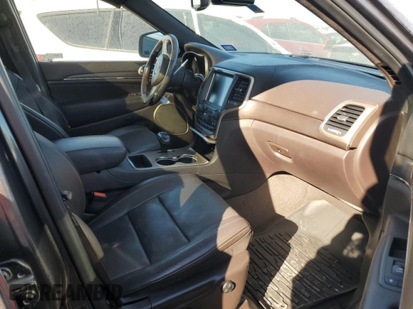 2014 Jeep Grand Cherokee Summit with VIN 1C4RJEJGXEC192532, listed as a Copart auction lot 86210124 with 72,401 mi miles and Salvage title. Bid and sale history available at DreamBid. Image 7.