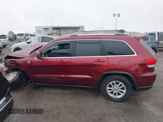 2020 Jeep Grand Cherokee North with VIN 1C4RJFAG1LC211424, listed as a IAAI auction lot 42430446 with 68,910 mi miles and . Bid and sale history available at DreamBid. Image 14.