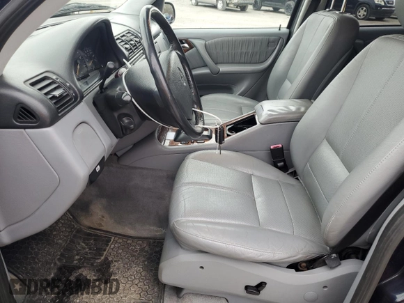 2002 Mercedes-Benz M-Class with VIN 4JGAB75E12A316799, listed as a Copart auction lot 51970785 with 176,915 mi miles and Salvage Title. Bid and sale history available at carsss.com. Image 7.