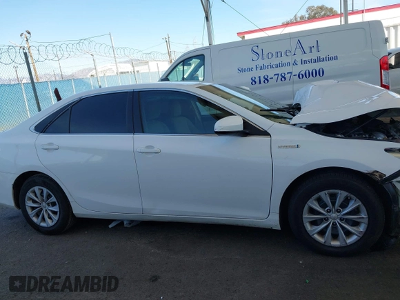 2017 Toyota Camry Hybrid LE with VIN 4T1BD1FKXHU206891, listed as a IAAI auction lot 41839609 with 142,744 mi miles. Bid and sale history available at carsss.com. Image 14.