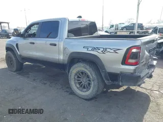 2021 Ram 1500 TRX with VIN 1C6SRFU92MN726050, listed as a IAAI auction lot 41175299 with 34,602 mi miles. Bid and sale history available at carsss.com. Image 3.