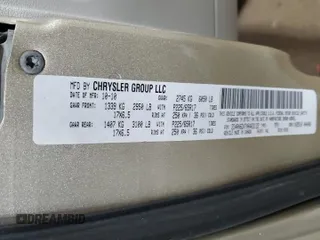 2010 Dodge Grand Caravan Crew with VIN 2D4RN6DX7AR463122, listed as a Copart auction lot 48768635 with 102,497 mi miles and Salvage Title. Bid and sale history available at DreamBid. Image 13.