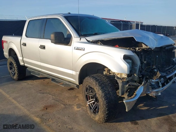 2018 Ford F-150 XL with VIN 1FTEW1E57JFC31779, listed as a IAAI auction lot 41784467 with 142,676 mi miles. Bid and sale history available at carsss.com. Image 1.