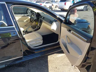 2016 Volkswagen Passat SE with VIN 1VWBS7A38GC038215, listed as a IAAI auction lot 40890685 with 55,064 mi miles and . Bid and sale history available at DreamBid. Image 5.