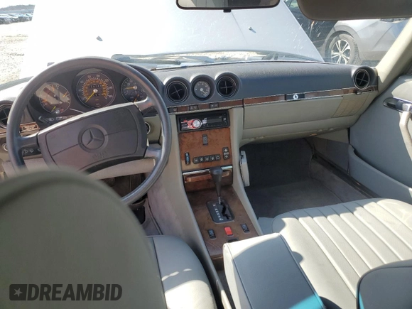 1989 Mercedes-Benz 560 Series 560SL with VIN WDBBA48D3KA097999, listed as a Copart auction lot 48649625 with 124,752 mi miles and Salvage Title. Bid and sale history available at carsss.com. Image 8.