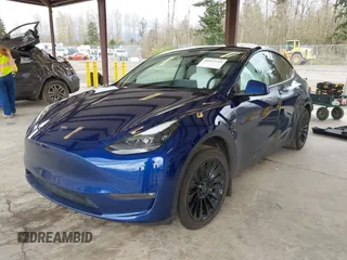 2023 Tesla Model Y Long Range with VIN 7SAYGDEEXPF621397, listed as a IAAI auction lot 41922714 with 29,460 mi miles. Bid and sale history available at carsss.com. Image 2.