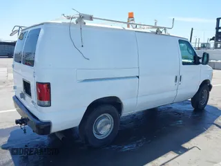 2006 Ford Econoline Cargo with VIN 1FTNE24L66HA64111, listed as a IAAI auction lot 41947445 with 205,025 mi miles and . Bid and sale history available at DreamBid. Image 4.