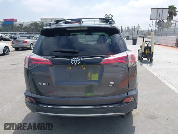 2017 Toyota RAV4 SE with VIN JTMJFREV5HJ155712, listed as a IAAI auction lot 42613998 with 72,112 mi miles and . Bid and sale history available at DreamBid. Image 16.