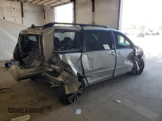 2010 Toyota Sienna XLE with VIN 5TDYK4CCXAS323450, listed as a Copart auction lot 62491545 with 220,121 mi miles and Salvage title. Bid and sale history available at DreamBid. Image 3.