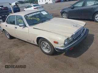 1986 Jaguar XJ with VIN SAJAV1341GC431953, listed as a IAAI auction lot 42416594 with 139,001 mi miles and . Bid and sale history available at DreamBid. Image 1.