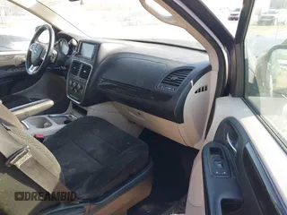 2013 Dodge Grand Caravan SXT with VIN 2C4RDGCG4DR602893, listed as a IAAI auction lot 41747242 with 206,213 mi miles and . Bid and sale history available at DreamBid. Image 5.