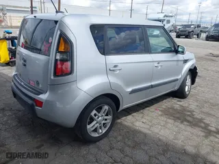 2011 Kia Soul + with VIN KNDJT2A22B7706579, listed as a IAAI auction lot 41921442 with 162,383 mi miles. Bid and sale history available at carsss.com. Image 4.