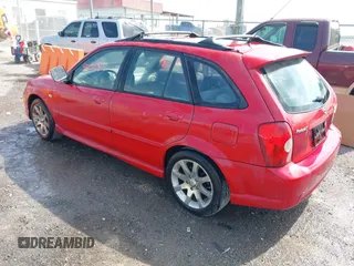 2003 Mazda Protege with VIN JM1BJ245231214946, listed as a IAAI auction lot 42163979 with 220,081 mi miles and . Bid and sale history available at DreamBid. Image 3.