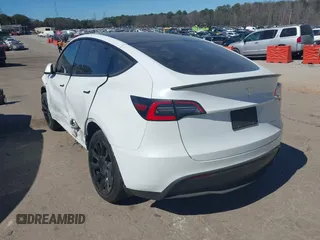 2021 Tesla Model Y Long Range with VIN 5YJYGDEE8MF125104, listed as a IAAI auction lot 41698065 with 25,177 mi miles and . Bid and sale history available at DreamBid. Image 3.