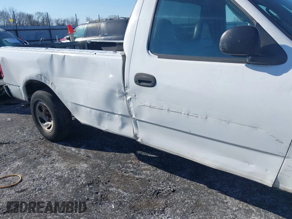 2003 Ford F-150 XL with VIN 1FTRF17W13NB65293, listed as a IAAI auction lot 41264978 with Not Provided miles and . Bid and sale history available at DreamBid. Image 6.