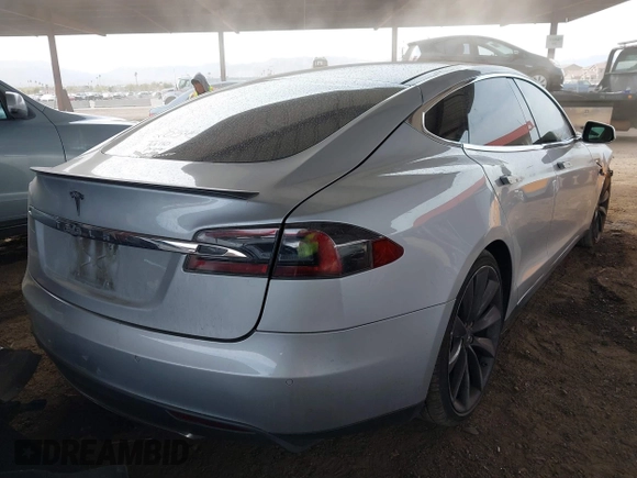 2014 Tesla Model S 60 with VIN 5YJSA1H17EFP35351, listed as a IAAI auction lot 41558434 with 151,002 mi miles and . Bid and sale history available at DreamBid. Image 4.