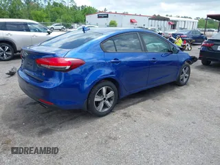 2018 Kia Forte LX with VIN 3KPFL4A77JE281839, listed as a IAAI auction lot 42012006 with 134,675 mi miles and . Bid and sale history available at DreamBid. Image 4.