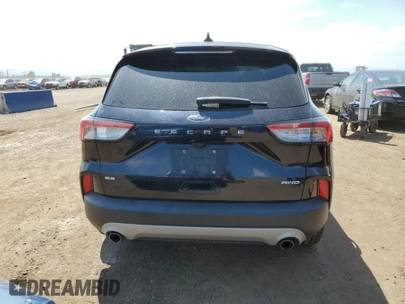 2021 Ford Escape SE with VIN 1FMCU9G66MUA94797, listed as a Copart auction lot 60864235 with 64,712 mi miles and Salvage title. Bid and sale history available at DreamBid. Image 6.