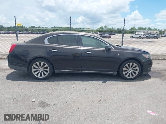 2014 Lincoln MKS with VIN 1LNHL9DK0EG605429, listed as a IAAI auction lot 42809745 with 127,038 mi miles and . Bid and sale history available at DreamBid. Image 13.