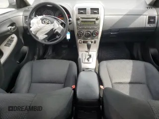 2010 Toyota Corolla with VIN 2T1BU4EEXAC457317, listed as a Copart auction lot 51596195 with 203,296 mi miles and Salvage Title. Bid and sale history available at carsss.com. Image 8.