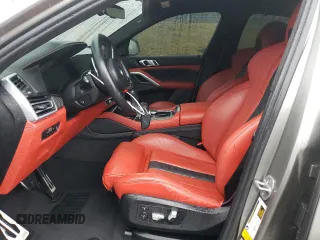 2022 BMW X6 M with VIN 5YMCY0C05N9N43128, listed as a Copart auction lot 84726734 with 18,565 mi miles and Salvage Title. Bid and sale history available at carsss.com. Image 7.