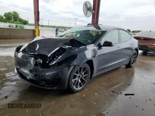 2022 Tesla Model 3 Long Range z VIN 5YJ3E1EB1NF285718, wystawiony jako Copart lot #60637075 z przebiegiem 146 789 mil mil oraz Czysty tytuł • Clean title. Historia ofert i sprzedaży dostępna na DreamBid. Obrazek 1.