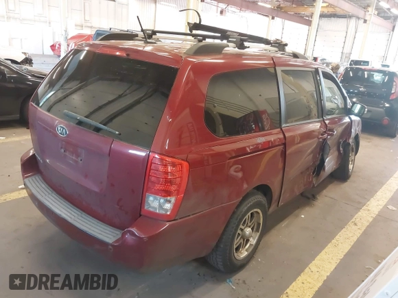 2011 Kia Sedona LX with VIN KNDMG4C78B6411157, listed as a IAAI auction lot 40671496 with 153,768 mi miles. Bid and sale history available at carsss.com. Image 4.