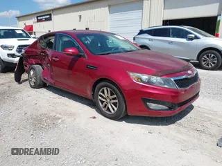 2013 Kia Optima LX z VIN 5XXGM4A73DG187566, wystawiony jako IAAI lot #42136713 z przebiegiem 73 406 mil mil oraz . Historia ofert i sprzedaży dostępna na DreamBid. Obrazek 1.