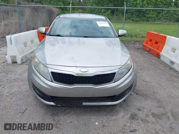 2013 Kia Optima EX z VIN 5XXGN4A70DG251141, wystawiony jako IAAI lot #42410478 z przebiegiem 245 963 mil mil oraz . Historia ofert i sprzedaży dostępna na DreamBid. Obrazek 6.