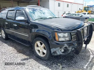 2013 Chevrolet Suburban LTZ with VIN 1GNSKKE7XDR267921, listed as a IAAI auction lot 42192231 with 243,600 mi miles and . Bid and sale history available at DreamBid. Image 1.