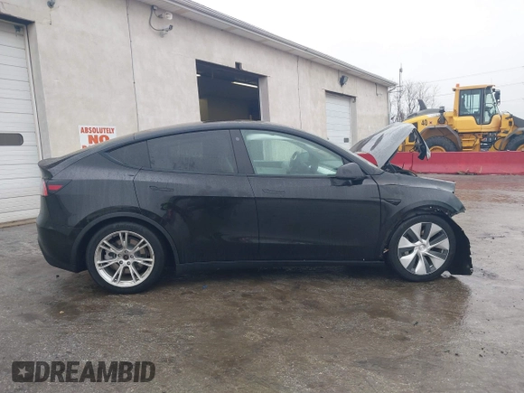 2021 Tesla Model Y Standard Range with VIN 5YJYGDED9MF103989, listed as a IAAI auction lot 41482268 with 33,485 mi miles and . Bid and sale history available at DreamBid. Image 14.