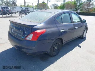 2014 Nissan Versa SV with VIN 3N1CN7AP9EL812462, listed as a IAAI auction lot 41890801 with 169,438 mi miles. Bid and sale history available at carsss.com. Image 4.