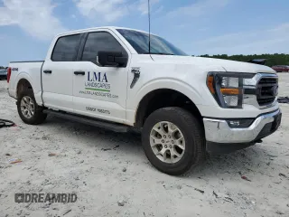 2023 Ford F-150 XL with VIN 1FTFW1E85PKG17275, listed as a Copart auction lot 57497155 with 34,379 mi miles and Salvage title. Bid and sale history available at DreamBid. Image 4.