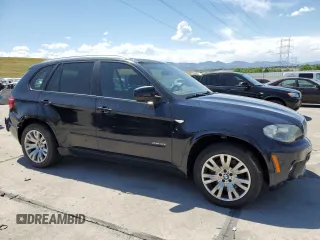 2012 BMW X5 50i with VIN 5UXZV8C59CL426057, listed as a Copart auction lot 63341775 with 92,822 mi miles and Clean title. Bid and sale history available at DreamBid. Image 4.