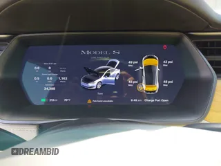 2020 Tesla Model S Long Range with VIN 5YJSA1E24LF415849, listed as a IAAI auction lot 42571945 with 34,398 mi miles and . Bid and sale history available at DreamBid. Image 7.