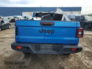 2020 Jeep Gladiator Sport S с VIN 1C6HJTAG5LL153853, выставлен на аукционе Copart как лот 56023925 с пробегом 31 143 миль миль и Списание • Salvage title. История ставок и продаж доступна на DreamBid. Изображение 6.