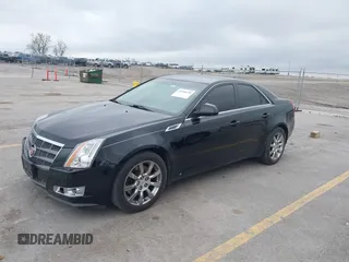 2008 Cadillac CTS AWD w/1SA with VIN 1G6DG577080180639, listed as a IAAI auction lot 42128238 with 141,133 mi miles. Bid and sale history available at carsss.com. Image 2.