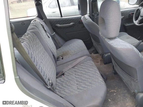1999 Toyota RAV4 with VIN JT3HP10VXX7115145, listed as a IAAI auction lot 41853011 with 211,121 mi miles. Bid and sale history available at carsss.com. Image 8.