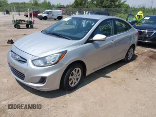 2014 Hyundai Accent GLS z VIN KMHCT4AE1EU637366, wystawiony jako IAAI lot #42455436 z przebiegiem 121 764 mil mil oraz . Historia ofert i sprzedaży dostępna na DreamBid. Obrazek 2.