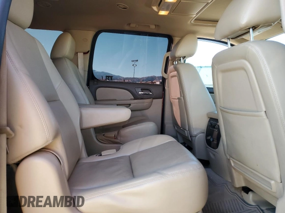 2014 Chevrolet Suburban LTZ with VIN 1GNSCKE08ER168239, listed as a Copart auction lot 42143915 with 137,902 mi miles and Salvage title. Bid and sale history available at DreamBid. Image 11.