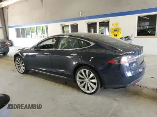 2014 Tesla Model S 60 with VIN 5YJSA1H10EFP52850, listed as a Copart auction lot 54321805 with 58,031 mi miles and Salvage Title. Bid and sale history available at DreamBid. Image 2.